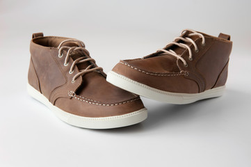 Male shoes over white