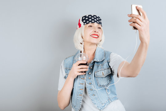 Senior Delighted Woman Taking Selfie.