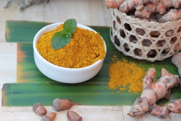 Turmeric powder and fresh root is herb.