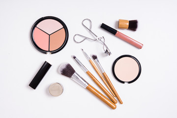 Professional makeup tools, flatlay on white background