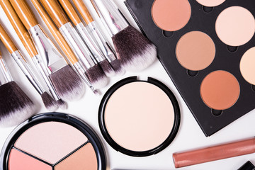 Professional makeup tools, flatlay on white background