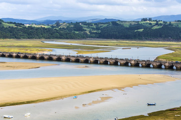 Fototapeta premium Old bridge in San Vicente de la Barquera, Spain