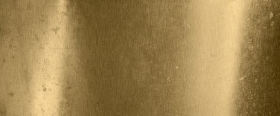 Old metal texture background in gold