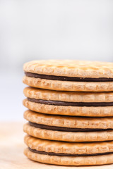 Stacked chocolate biscuits with copy space