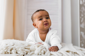 Portrait of a mixed race baby boy