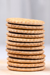 Stacked chocolate biscuits with copy space
