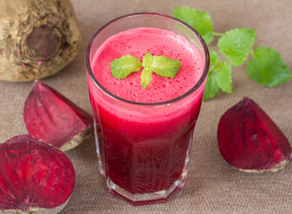 beetroot juice in glass and beetroot vegetables