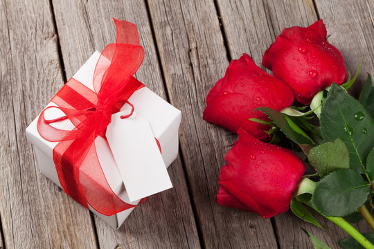 Valentines day gift box and red roses
