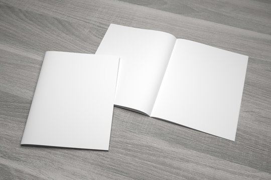 Blank opened 3D illustration magazine mockup with cover on wood.