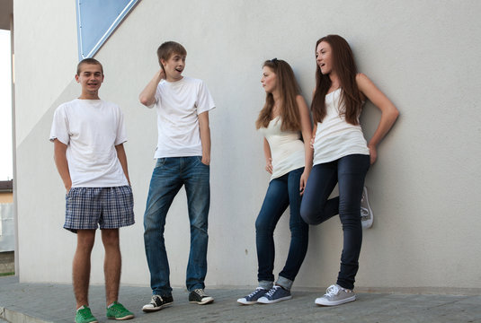 teen boys get acquainted with the girls on the street