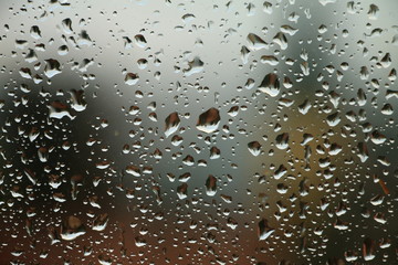 Rain drops on window , rainy day