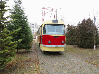 Fototapeta na wymiar Red old vintage classic rusty abandoned tram