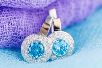 Luxury earrings with zircon and blue gemstones