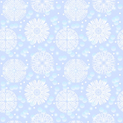 Seamless pattern with snowflakes on a blue background