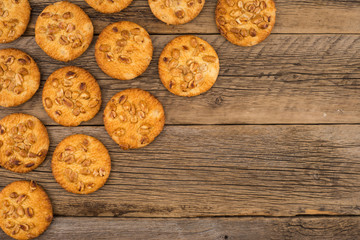 Cookies with peanut on old wooden table.