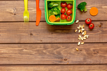 ingredients for children's lunch on wooden background top view