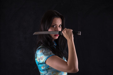 Fototapeta premium Samurai Girl, female ninja, samurai sword, katana, studio portrait