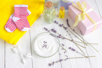 baby organic cream with lavender on shelf in bathroom