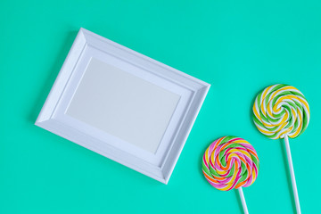 birth of child - lollipop with photo frame blue background