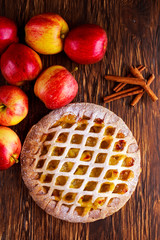 Home baked Lattice apple pie on wooden table