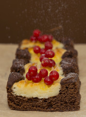 Pieces of cheesecake with berries