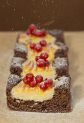 Pieces of cheesecake with berries