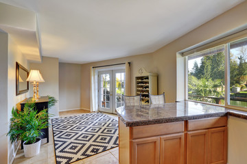 Hallway interior with white and black rug