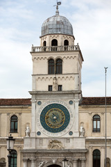 Clock tower building of medieval origins overlooking Piazza dei Signori in Padova, Italy