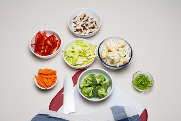 vegetables cut for stir fried cooking for asian cuisine food on the white background
