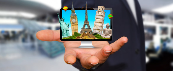 Man travelling the world with his computer