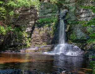 Fototapeta na wymiar Glistening Waterfall