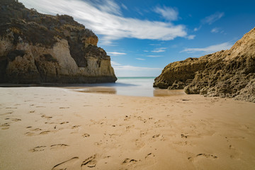 Foot steps in the sand
