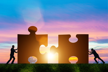 Business concept of teamwork with jigsaw puzzle
