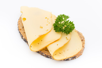 Cheese slices on bread. White background.