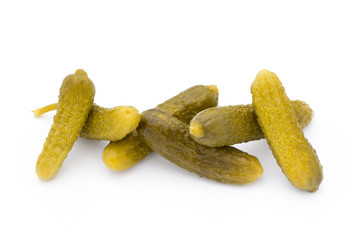 Marinated pickled cucumbers isolated on the white.