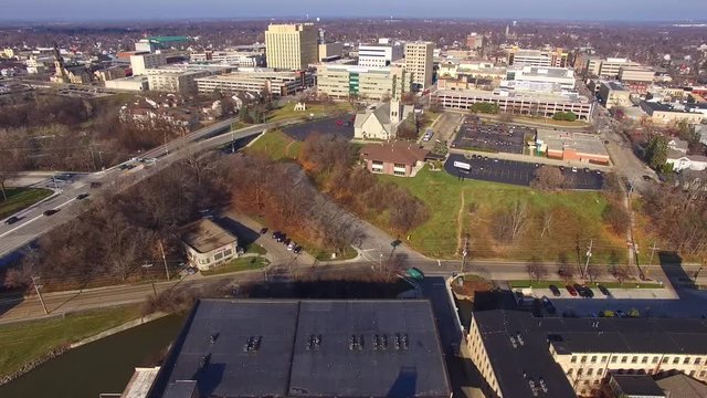 Appleton Wisconsin's Scenic Downtown Buildings, Aerial Flyover. Looking toward College Avenue from Waterfront area.