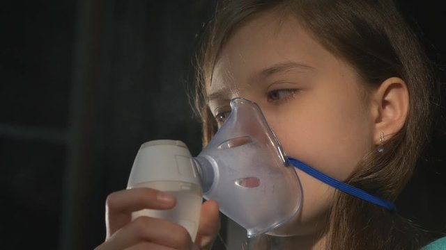 Inhalation Sick Girl with Inhaler in Living Room