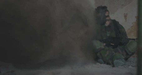 Gas mask soldier and gas coming down the hall