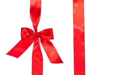 Red vertical gift ribbons and luxurious bow