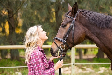 Beautiful elegance back woman cowgirl, riding a horse wearing bl