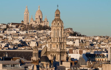 Fototapeta premium The Saint Trinity church and Sacre Coeur basilica, Paris, France