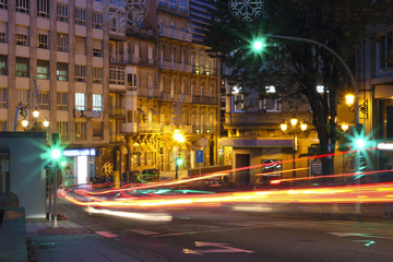Fototapeta na wymiar Vigo at night with cars in motion