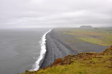 Dyrhólaey peninsula located in southern Iceland near Vik village, known for black beaches