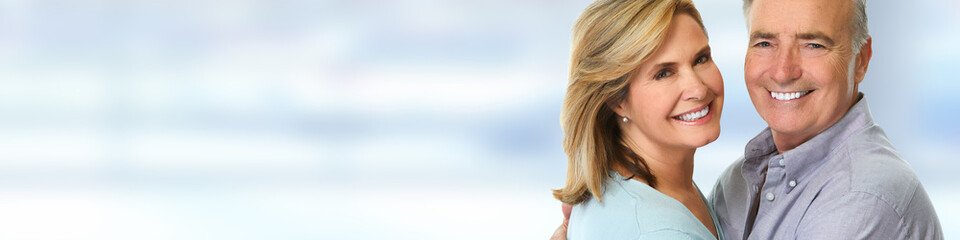 Senior couple smiling.