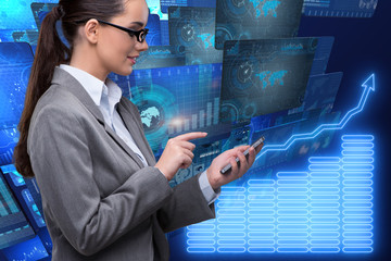 Businesswoman in online stock trading business concept
