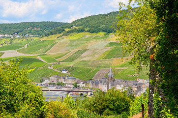 Moselle Valley Germany: View to the old town Bernkastel-Kues with vineyards and river Mosel in...