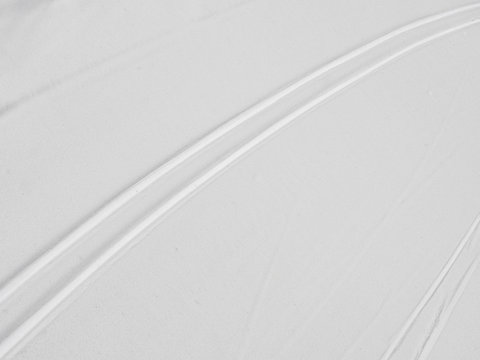 Ski track on snow surface, skiing trail