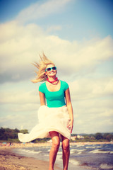 Pretty woman wearing nice clothing.