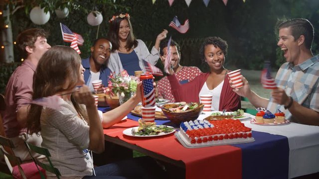 Friends Celebrating 4th Of July With Backyard Party