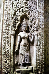 Obraz premium Cambodian statue on a wall